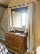 Inverted pleat linen curtains on 19mm diameter black French pole. Cotswold Barn conversion near Cheltenham.